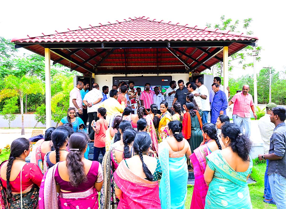 Guests enjoying an outdoor LED screen event at Go Ranch Resort, perfect for live screenings, cultural programs, and group entertainment near Hyderabad