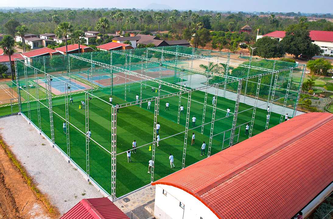 best box cricket resorts in hyderabad. An overhead view of an outdoor Box Cricket at Go Ranch Resort